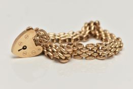 A 9CT GOLD BRACELET, brick link bracelet, hallmarked 9ct Birmingham, fitted with a heart padlock