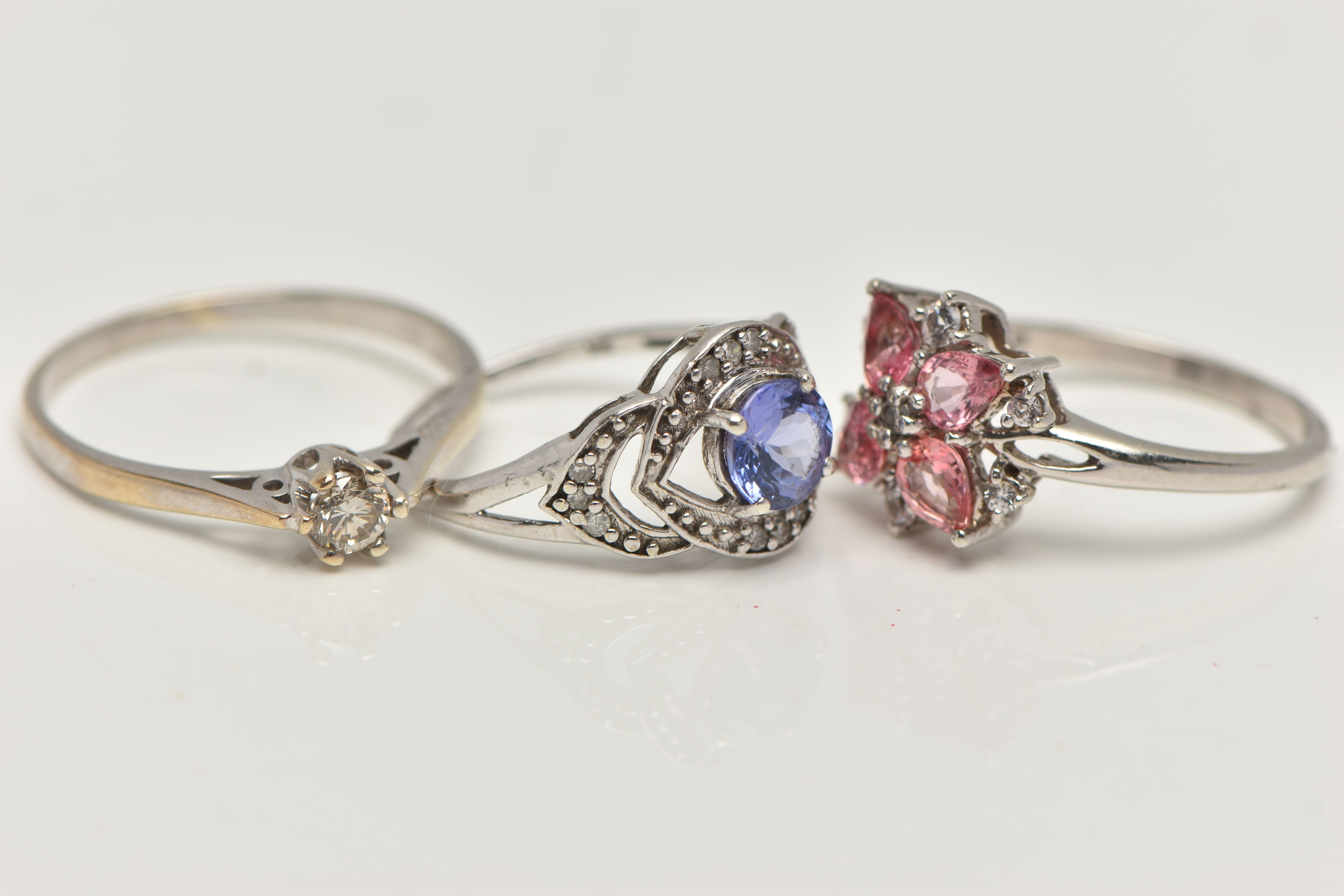 THREE GEM SET RINGS, to include a 9ct white gold single stone diamond ring, round brilliant cut - Image 3 of 4