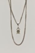 A DIAMOND PENDANT NECKLACE, the emerald cut diamond within a four claw setting suspended from a curb