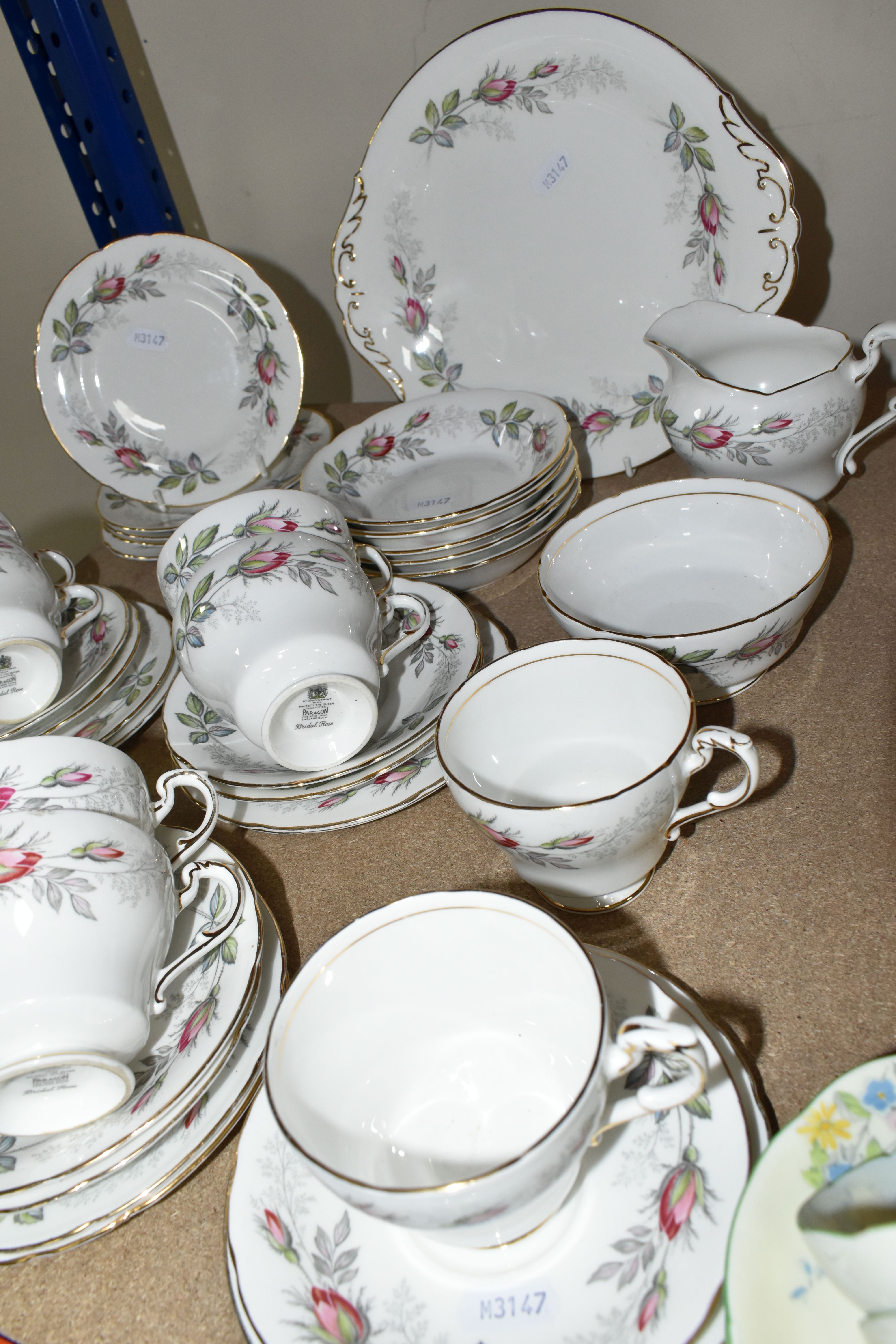 TWO PARAGON TEA SETS, comprising a twenty four piece tea set printed and tinted with butterflies, - Image 11 of 12