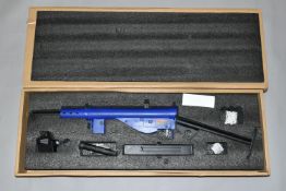 A BOXED ELECTRICALLY POWERED BB COPY OF A STEN GUN, bearing no makers name or serial number, appears