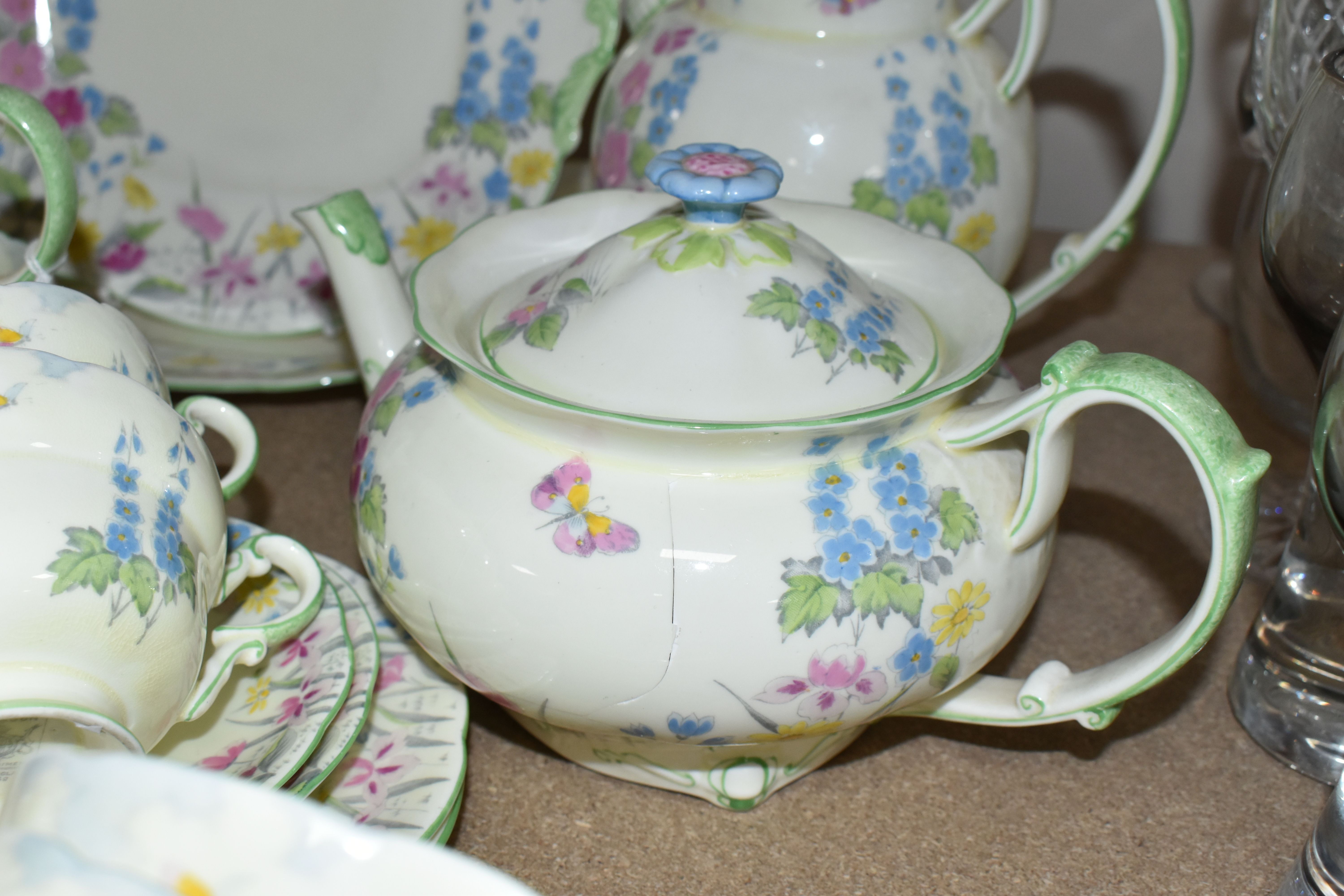 TWO PARAGON TEA SETS, comprising a twenty four piece tea set printed and tinted with butterflies, - Image 7 of 12