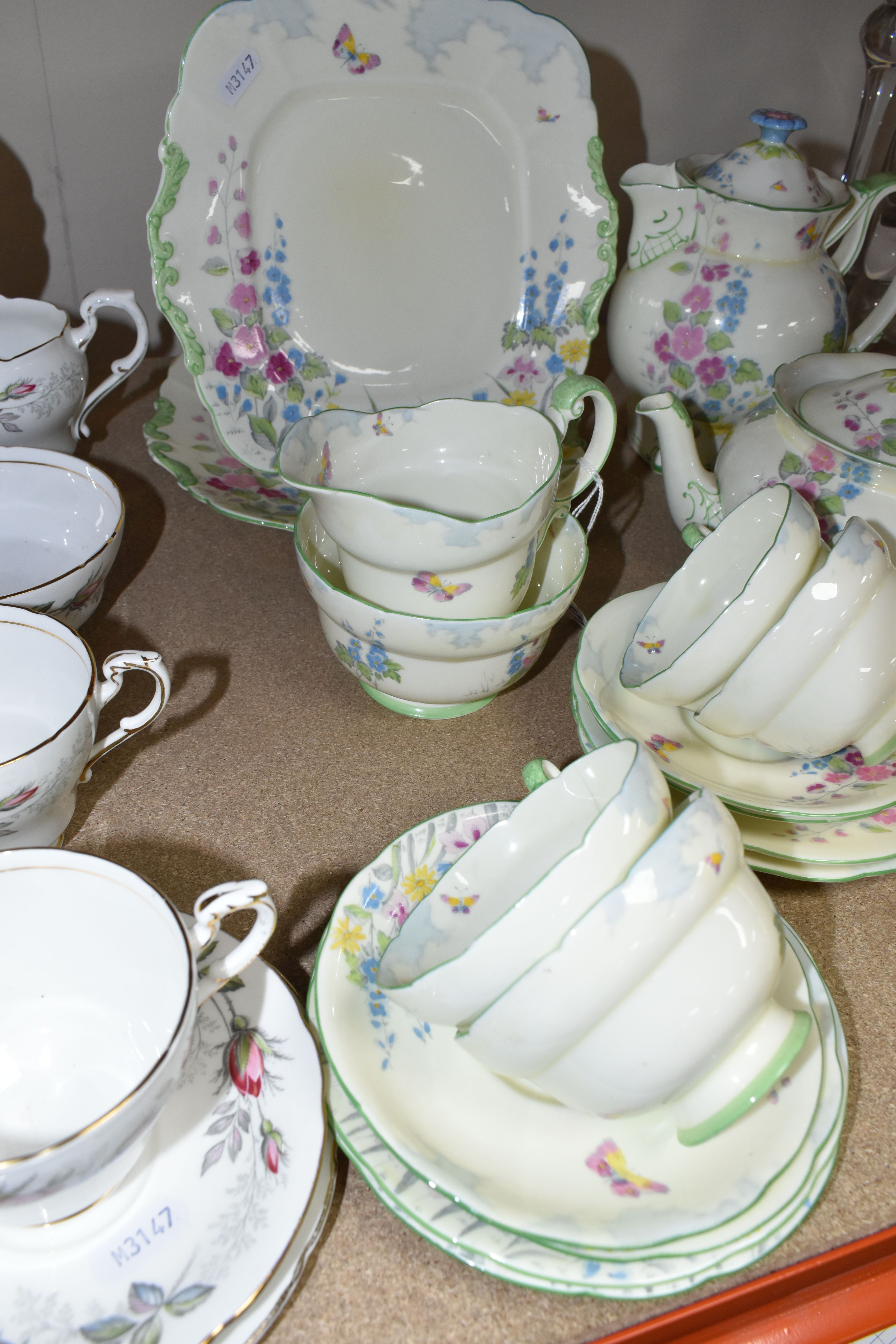 TWO PARAGON TEA SETS, comprising a twenty four piece tea set printed and tinted with butterflies, - Image 12 of 12