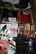 TWO BOXES OF POP MUSIC MEMORABILIA to include a collection of 25 tour 'T' Shirts (appear unused)