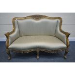 A FRENCH LOUIS XV STYLE GILT WOOD SOFA, with foliate decoration, with six legs, length 127cm x depth