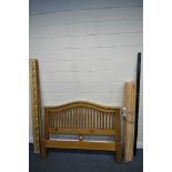 A MODERN PINE 5 FT BED STEAD, with side rails, slats, and central support (condition - good