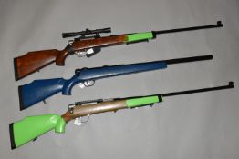 THREE BB BOLT ACTION SPRING OPERATED AIR RIFLES, one fitted with a scope, all cock and discharge,