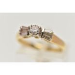 AN 18CT GOLD, DIAMOND RING, designed with a central round brilliant cut diamond, in a raised four