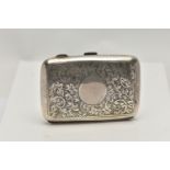 AN EARLY 20TH CENTURY SILVER CIGARETTE CASE, of rectangular outline with central circular vacant
