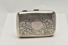 AN EARLY 20TH CENTURY SILVER CIGARETTE CASE, of rectangular outline with central circular vacant