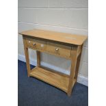 A MODERN LIGHT OAK SIDE TABLE, with two drawers, width 85cm x depth 36cm x height 78cm (condition:-