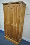 A MODERN PINE PANELLED TWO DOOR WARDROBE, width 94cm x depth 59cm x height 197cm (condition:-surface