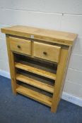 A SOLID LIGHT OAK OPEN BOOKCASE, with two drawers, width 84cm x depth 33cm x height 111cm (