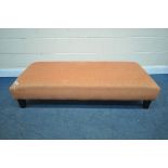 A LONG RED AND BEIGE UPHOLSTERED FOOTSTOOL, length 155cm x depth 69cm x height 35cm (condition:-