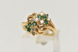 AN 18CT GOLD, DIAMOND AND EMERALD DRESS RING, asymmetrical design set with seven round brilliant cut