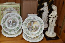 EIGHT ROYAL DOULTON 'BRAMBLY HEDGE' PLATES, AND TWO CAPODIMONTE FIGURES, the Brambly Hedge plates