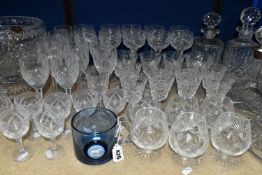 A GROUP OF CUT CRYSTAL DECANTERS, STUART CRYSTAL PUNCH SET AND DRINKING GLASSES, comprising a pair