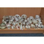 A COLLECTION OF CRESTED WARES, approximately fifty pieces, many related to the Isle of Man, to