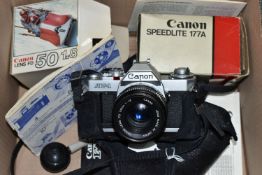 A CANON AV-1 FILM SLR CAMERA, a boxed FD 50mm f1.8 lens, a Speedlite 177A etc