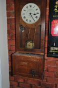 A GLEDHILL-BROOK TIME RECORDERS OF HUDDERSFIELD VINTAGE CLOCKING MACHINE in oak case with two