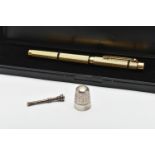 A GOLD PLATED 'SHEAFFER' FOUNTAIN PEN A THIMBLE AND TOOTHPICK, gold plated engine turned pattern