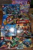 A TRAY OF BOXED AND LOOSE LEGO SETS, to include a Lego city The Mine 4204, taped up on the sides