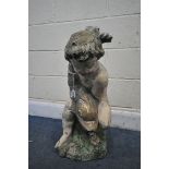 AN ANTIQUE COMPOSITE ORIENTAL WATER FEATURE, of a boy holding a fish, height 65cm (condition:-