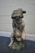 AN ANTIQUE COMPOSITE ORIENTAL WATER FEATURE, of a boy holding a fish, height 65cm (condition:-