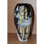 A MOORCROFT POTTERY LIMITED EDITION 'CHRISTMAS WELCOME' VASE, tube lined with a church and trees