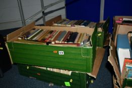 FOUR BOXES OF BOOKS containing approximately 190 titles in hardback and paperback formats,