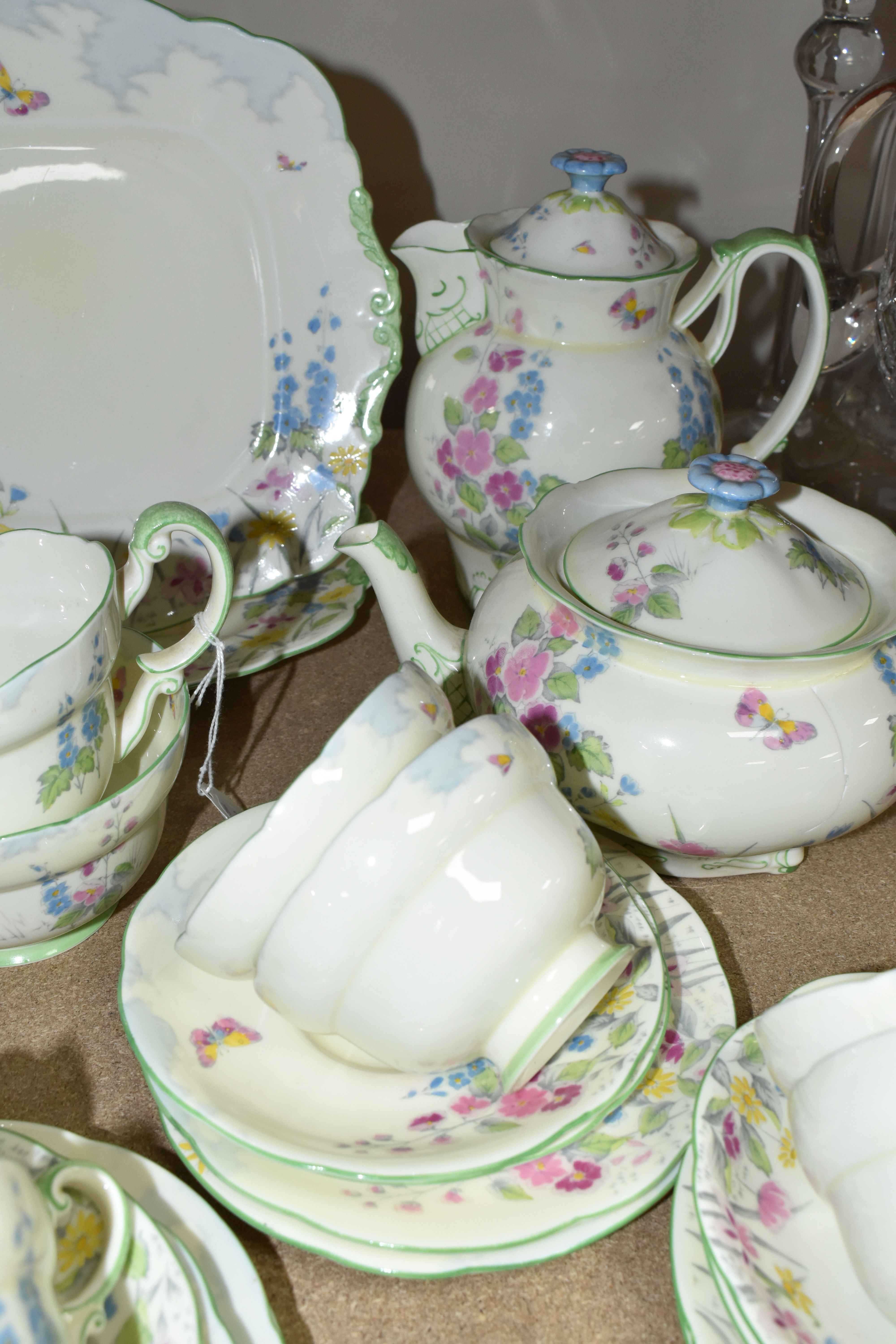 TWO PARAGON TEA SETS, comprising a twenty four piece tea set printed and tinted with butterflies, - Image 4 of 12