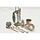 A SMALL BOX OF ASSORTED ITEMS, to include a white metal manicure stand with three manicure items,