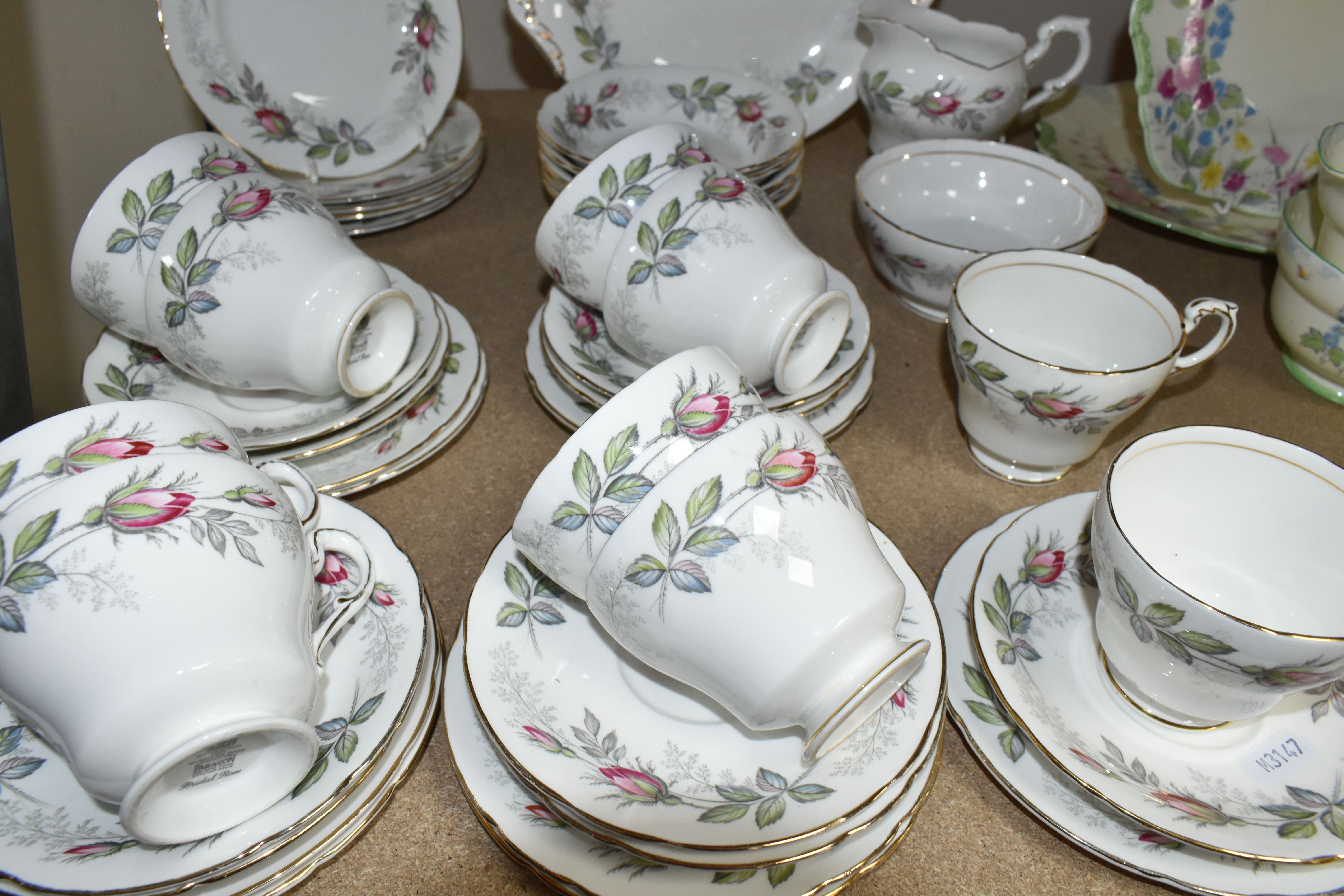 TWO PARAGON TEA SETS, comprising a twenty four piece tea set printed and tinted with butterflies, - Image 9 of 12