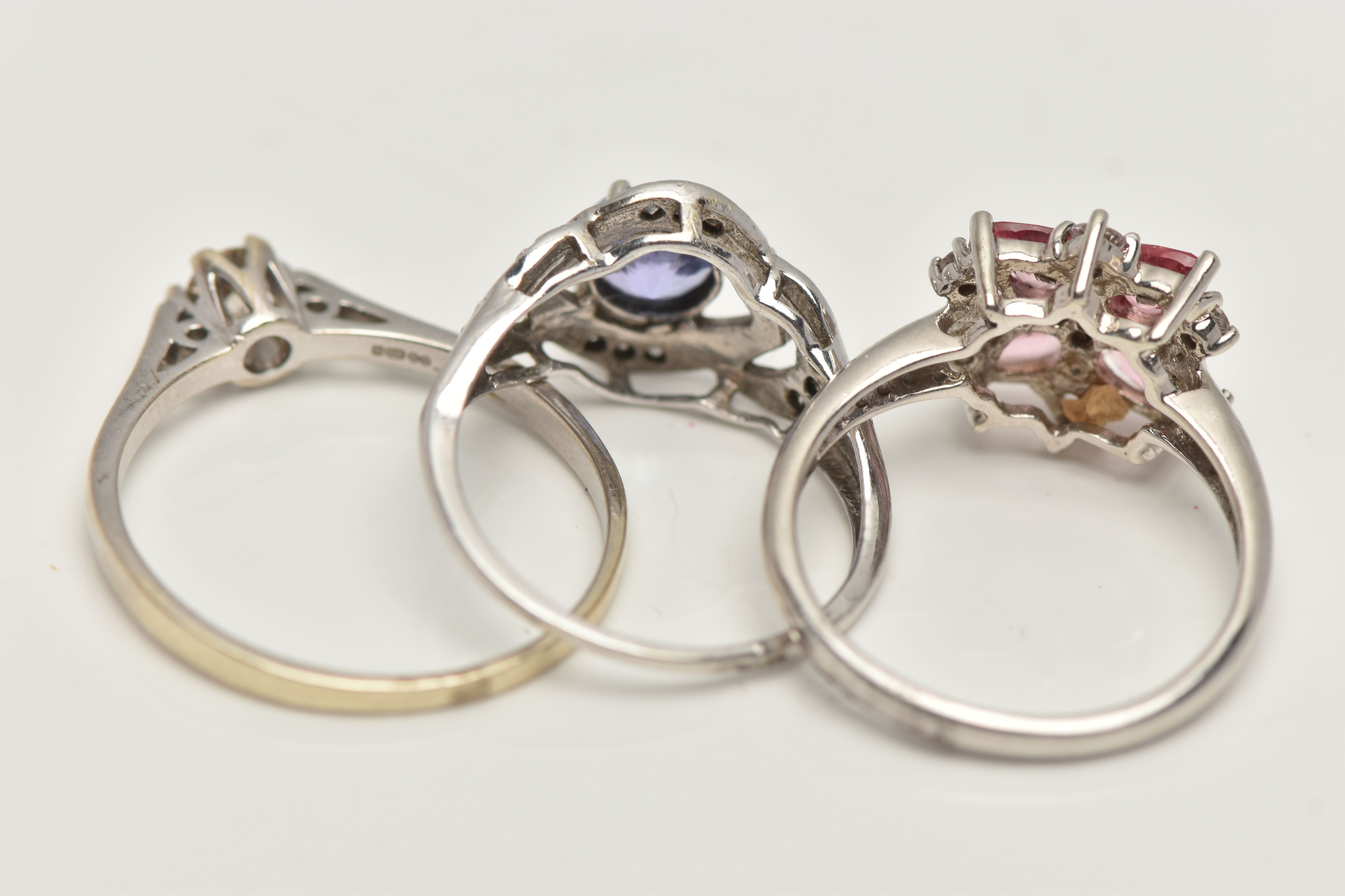 THREE GEM SET RINGS, to include a 9ct white gold single stone diamond ring, round brilliant cut - Image 4 of 4