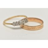 A YELLOW METAL DIAMOND RING AND A BAND RING, five stone graduated diamond ring, estimated total