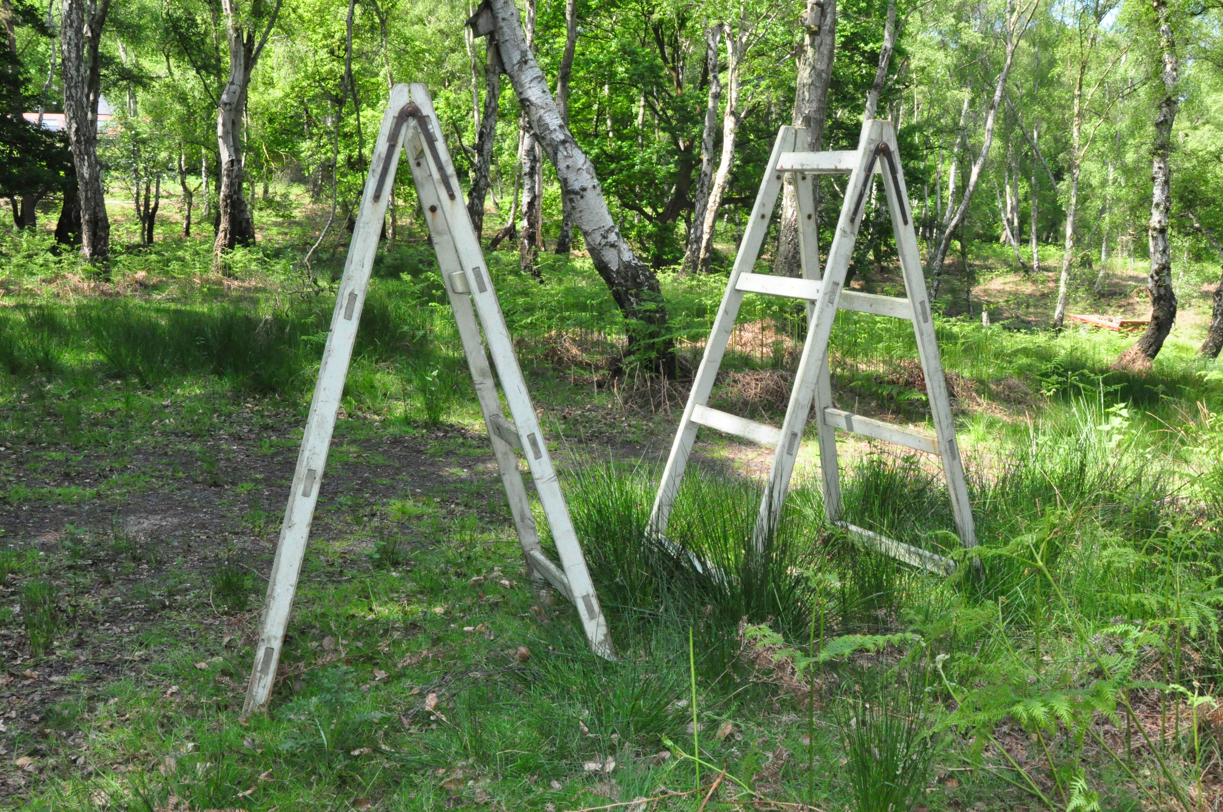 A PAIR OF VINTAGE A FRAME STANDS with rungs to both sides standing height 186cm width at base