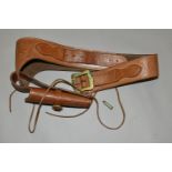 A GOOD QUALITY HEAVILY TOOLED GUN BELT AND HOLSTER, with a number of inert cartridges
