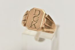 A 9CT GOLD SIGNET RING, rectangular signet with engraved initials 'DGK', tapering shoulders