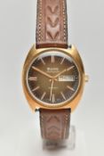 AN AUTOMATIC BULOVA AMBASSADOR, textured ombre dial with gold baton markers, day-date function at