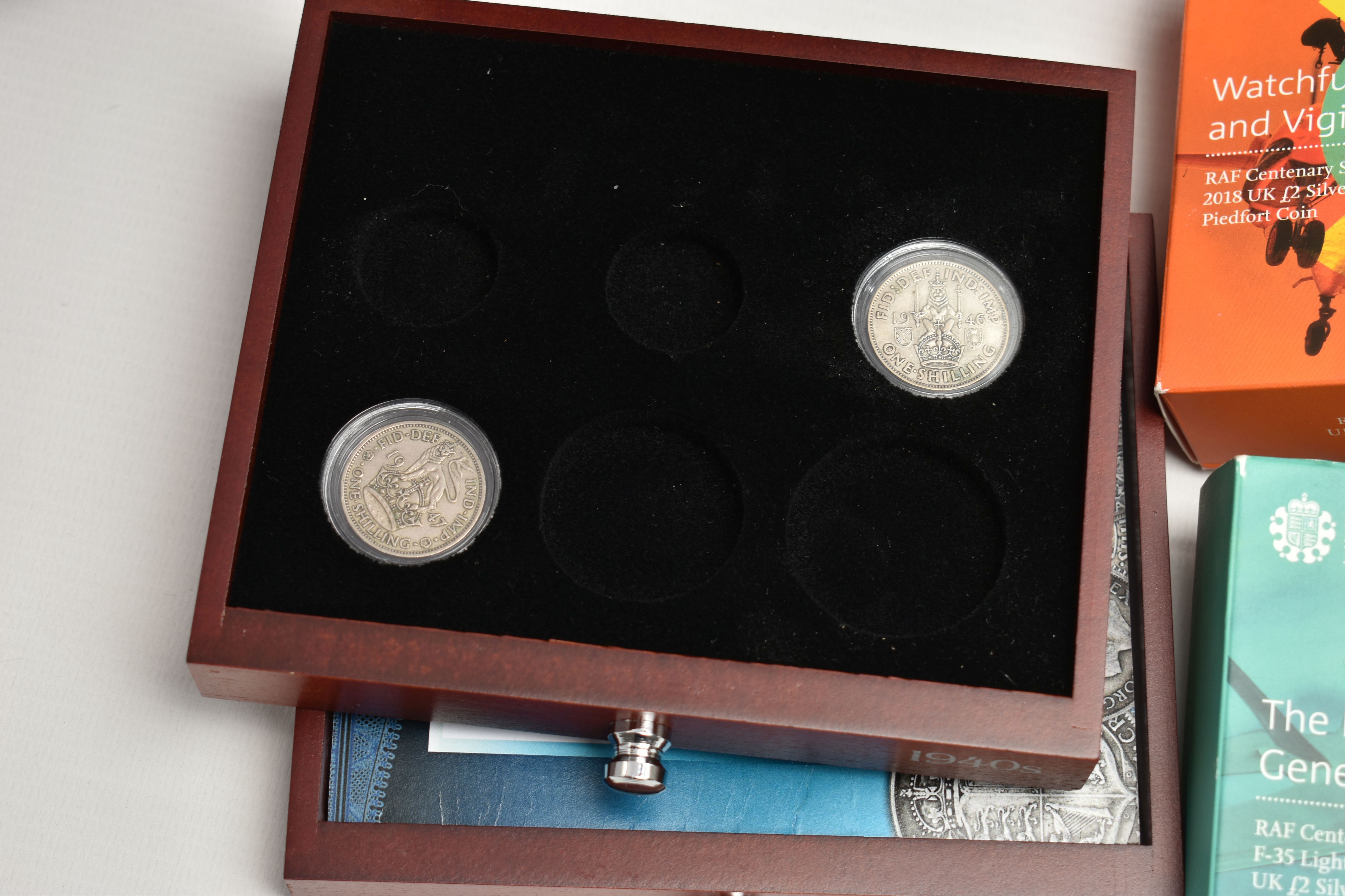 A GLAZED DISPLAY BOX THREE DECADES of GEORGE V STAMP AND COIN SET, to include four trays of silver - Image 13 of 18