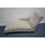 A SPOTTED UPHOLSTERED CHAISE LONGUE, length 160cm
