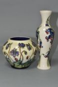 TWO MOORCROFT POTTERY VASES, comprising a bulbous vase in the 'Hepatica' pattern, tube lined with