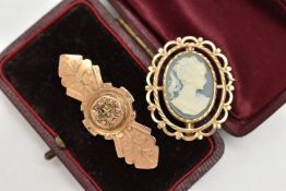 TWO 9CT GOLD BROOCHES, the first a late Victorian elongated brooch with scrolling and rope twist