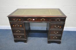 A MAHOGANY PEDESTAL DESK, with a green leather writing surface, over nine assorted drawers, width
