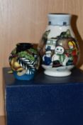 A BOXED MOORCROFT 'CHRISTMAS MORNING' VASE, together with a miniature 'Deck The Bells' pattern