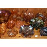 A COLLECTION OF CARNIVAL GLASS, over forty pieces to include a punch bowl and cups, bowls, jugs, and