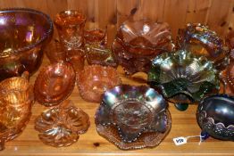 A COLLECTION OF CARNIVAL GLASS, over forty pieces to include a punch bowl and cups, bowls, jugs, and