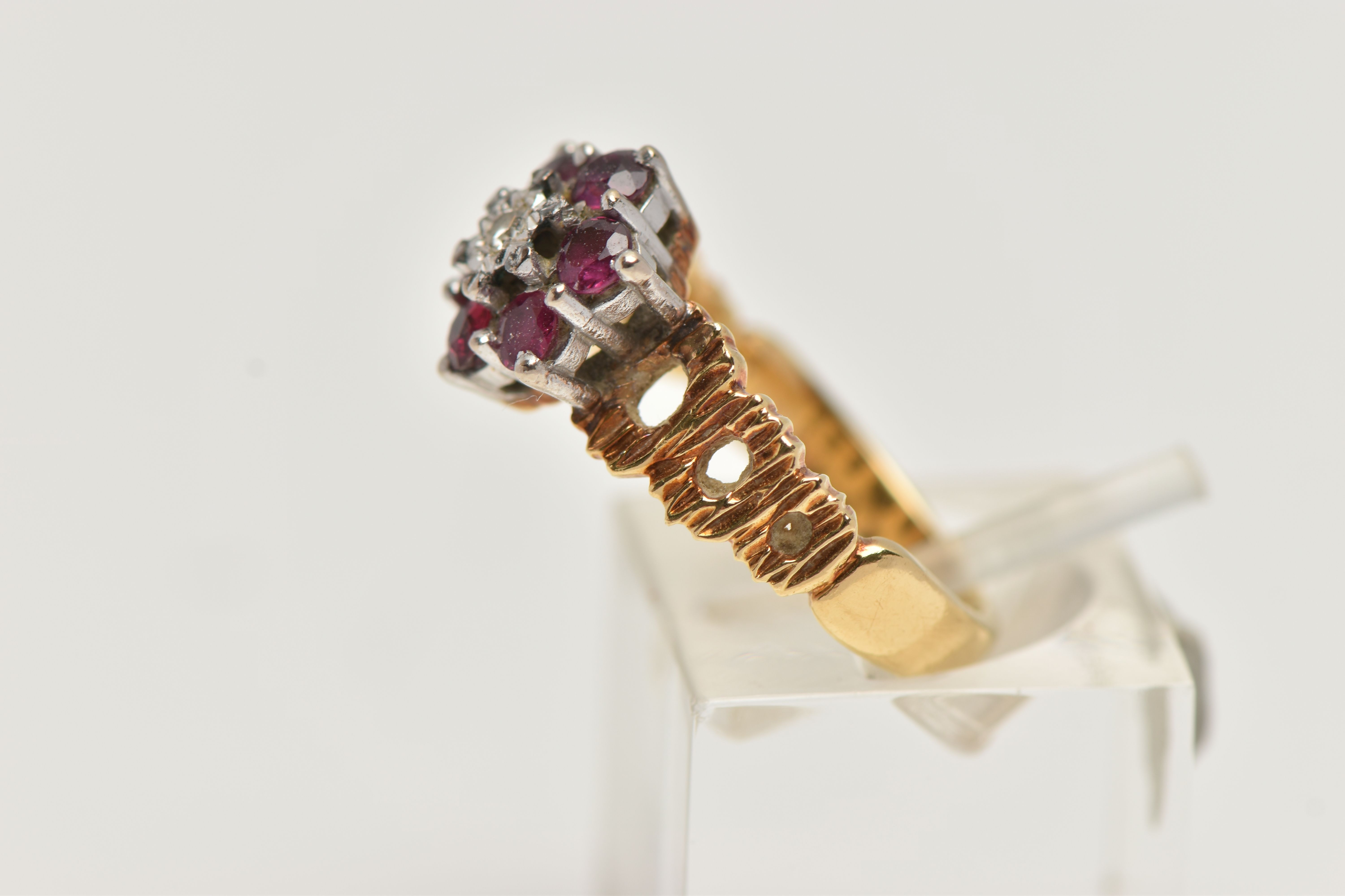 A YELLOW METAL DIAMOND AND RUBY CLUSTER RING, centrally set with a single cut diamond illusion - Image 2 of 4