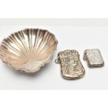 A STERLING SILVER SHELL SHAPED DISH AND TWO VESTA CASES STAMPED 925, the dish on three ball feet,