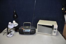 A SELECTION OF HOUSEHOLD ELECTRICALS, comprising of a Russell Hobbs Microwave, a JVC Portable CD/